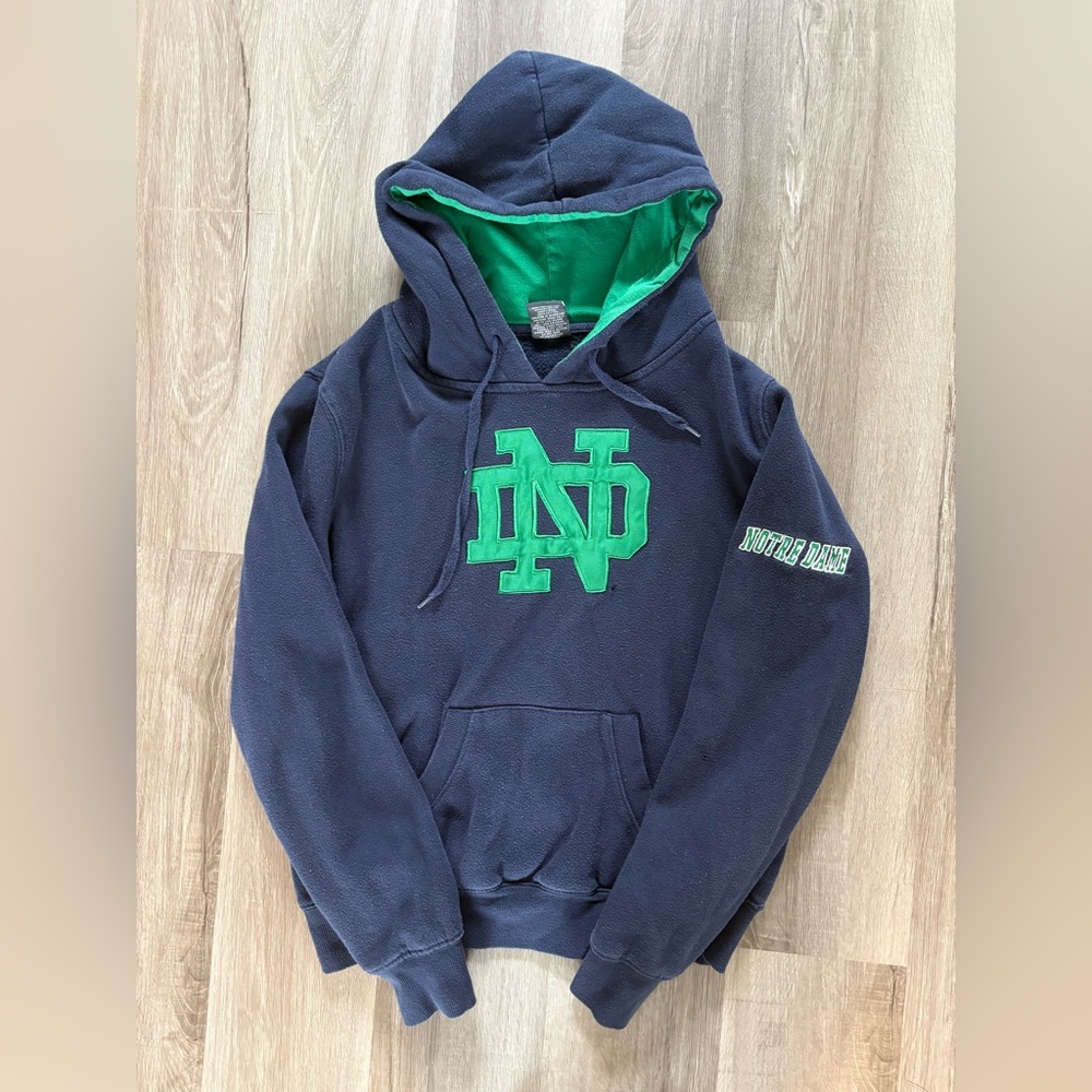 Stadium Athletics Navy Hoodie with Green Notre Dame Logo